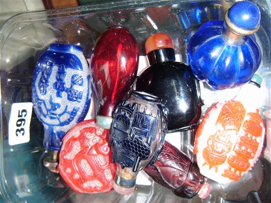 Eight Chinese glass snuff bottles, including two Hundred Antiques overlaid examples